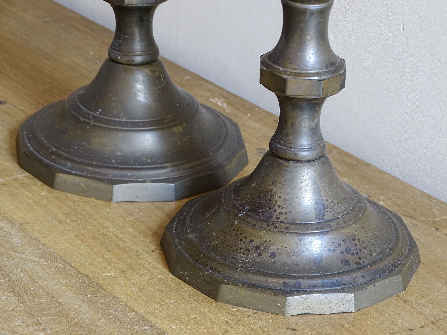 Pair of large French antique altar candlesticks with octagonal bases and tall architectural stems