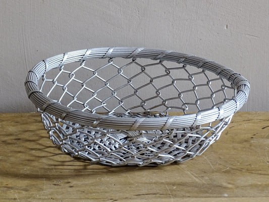 A French vintage silver coloured, round, wire basket. 