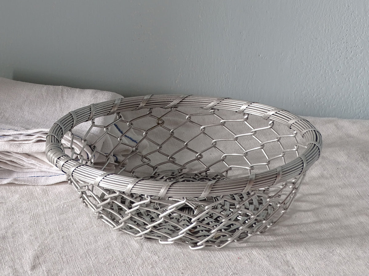 French vintage wire bread basket with antique linen