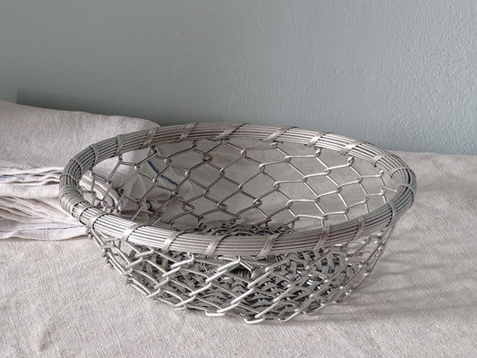 French vintage wire bread basket with antique linen