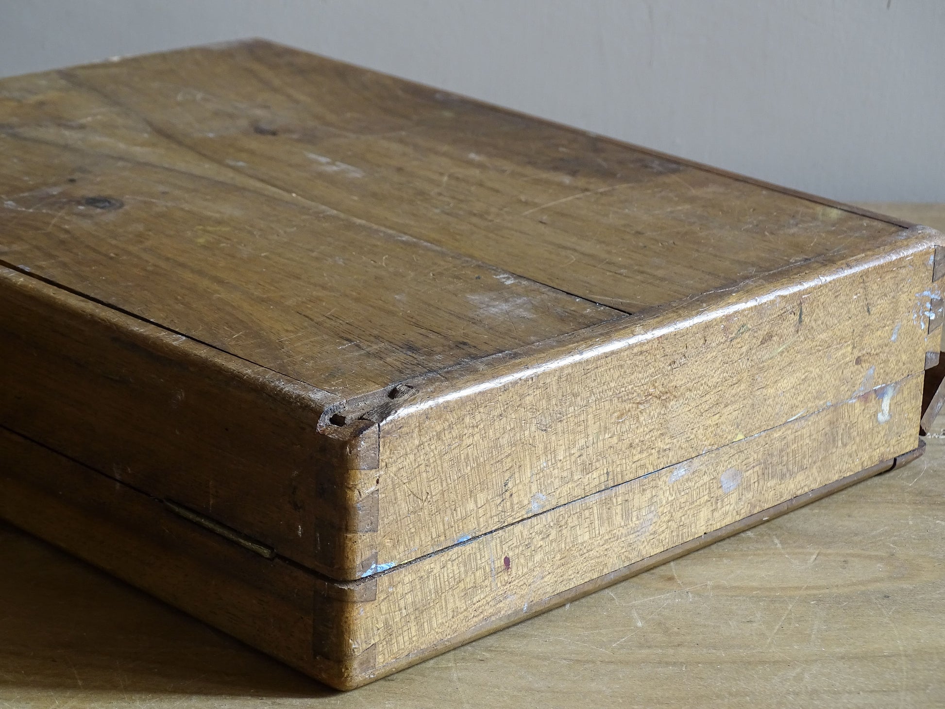 Paint-stained antique French art box with palette and fitted storage sections