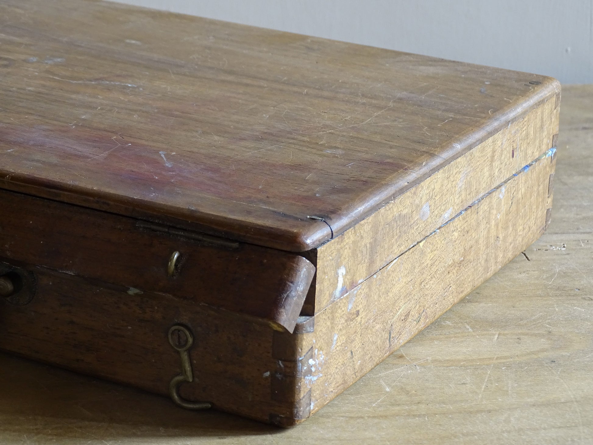 Antique studio paint box with palette, oil colour tubes and painting accessories