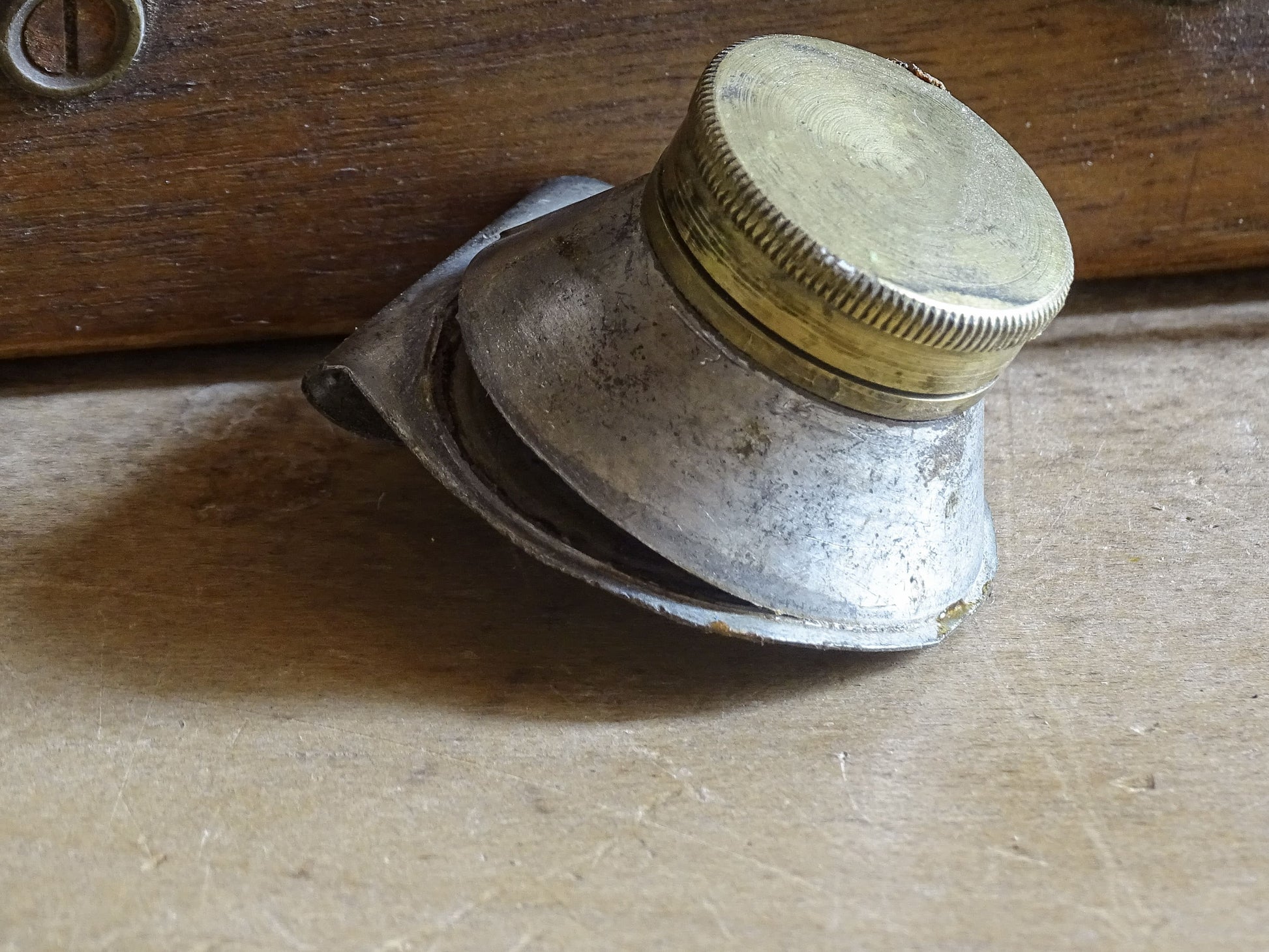 Decorative antique artist’s box containing brushes, paint tubes and metal containers