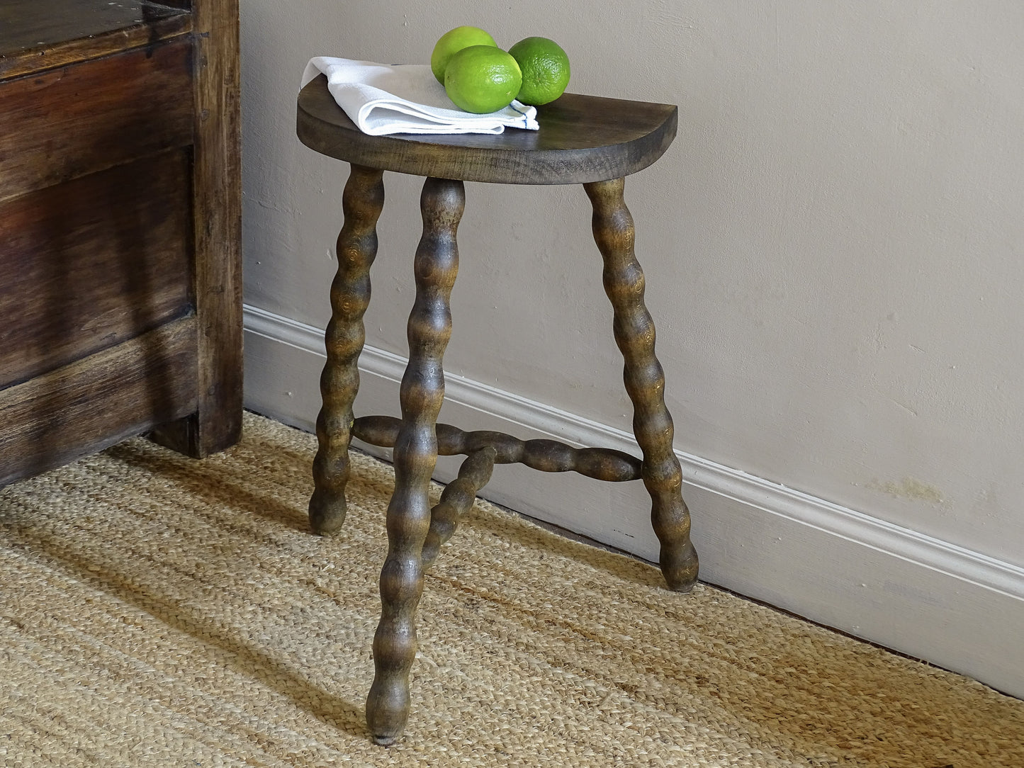 Vintage French demi-lune wooden stool with bobbin-turned legs