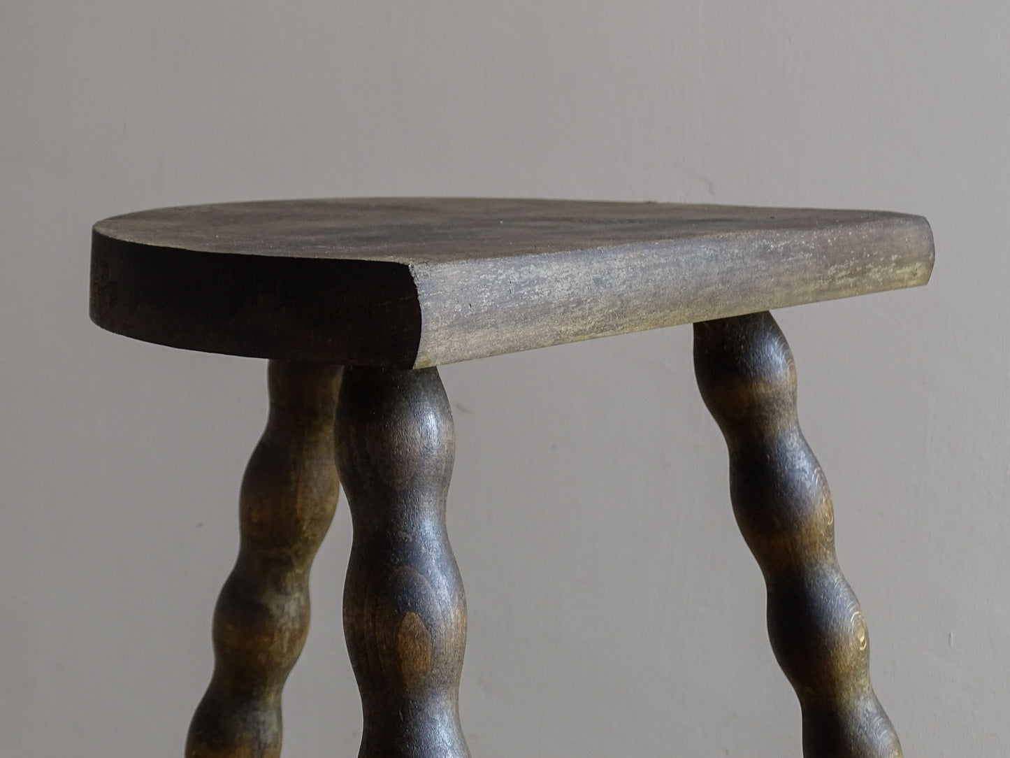 Vintage tripod stool with decorative turned wooden legs
