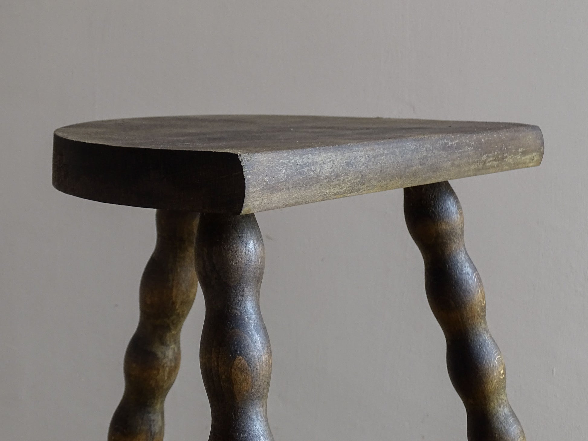 Vintage tripod stool with decorative turned wooden legs