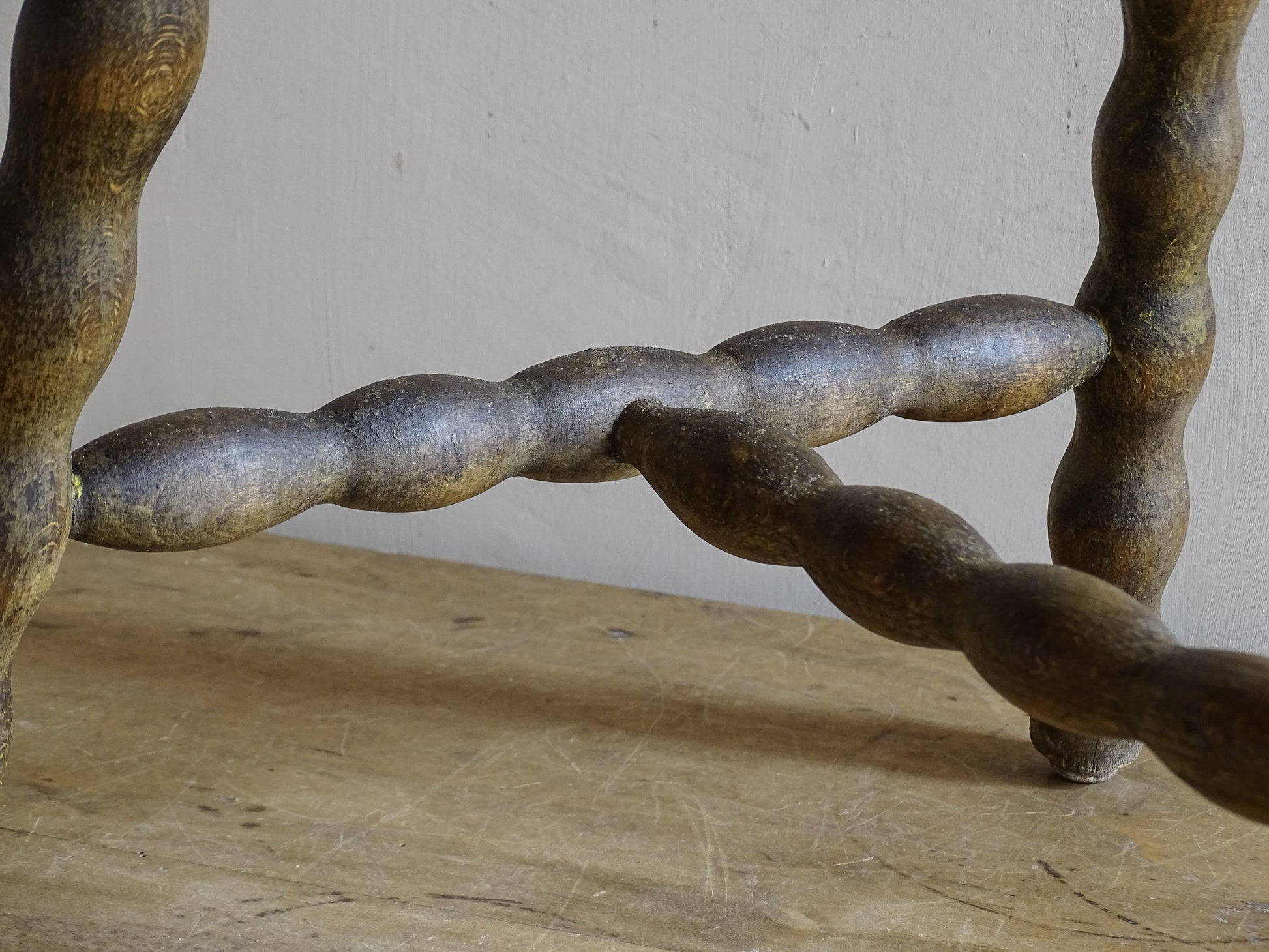 Vintage French stool with splayed legs and turned stretchers
