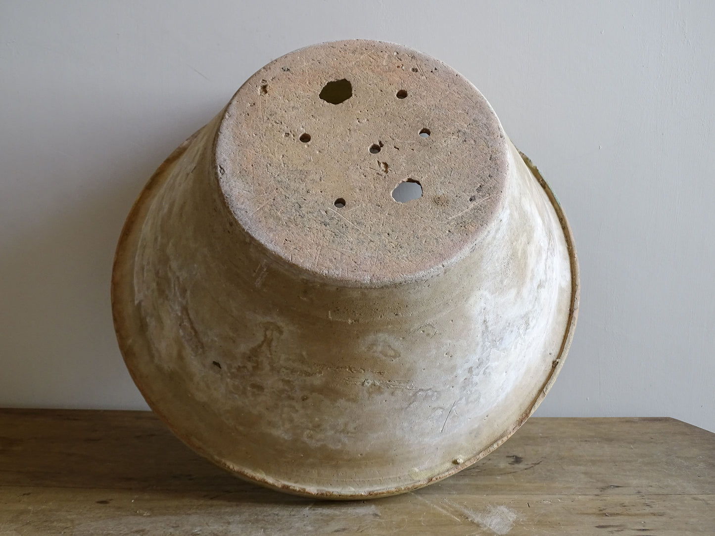 Antique French terracotta planter with yellow glaze and aged patina