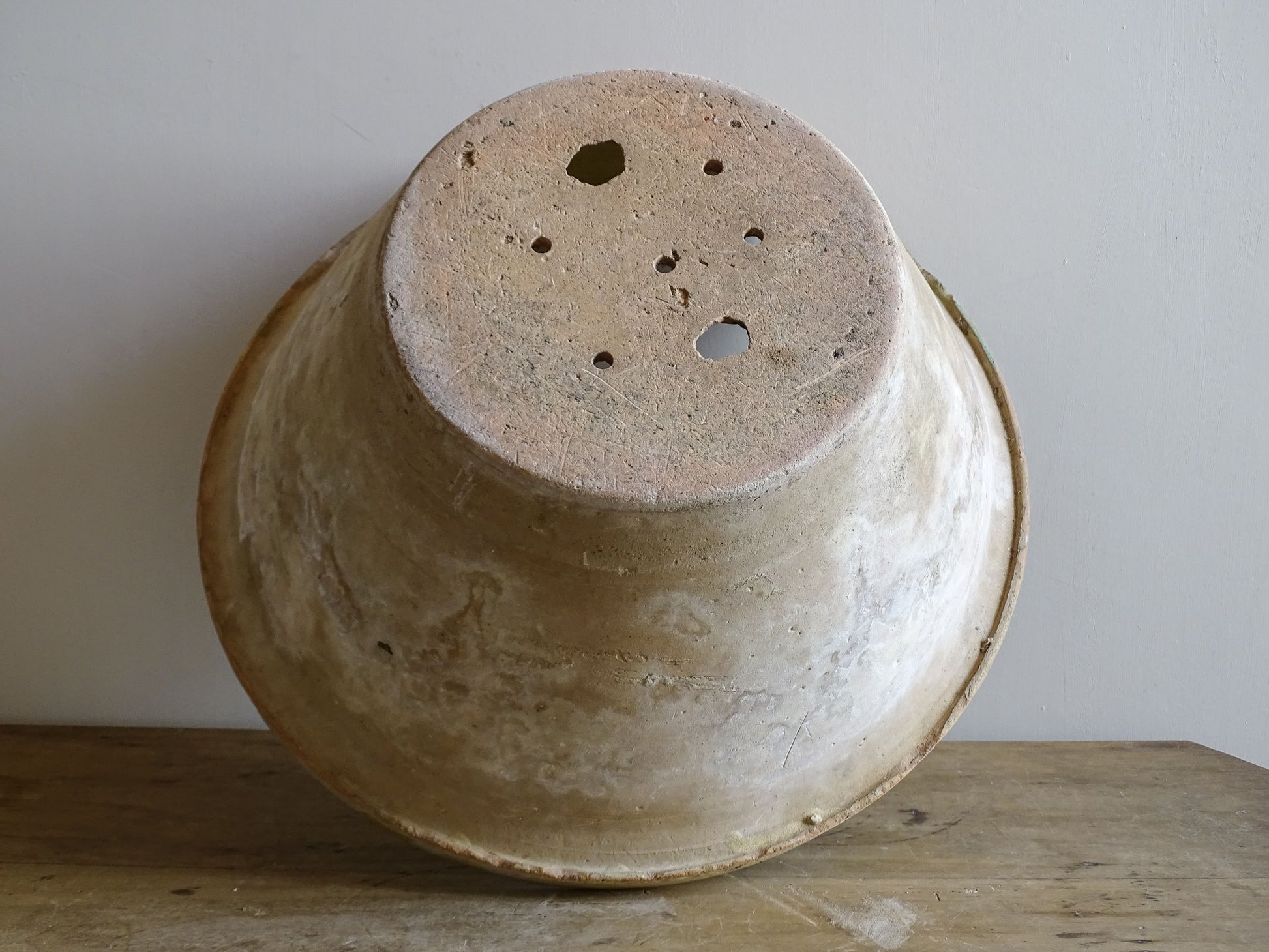 Antique French terracotta planter with yellow glaze and aged patina
