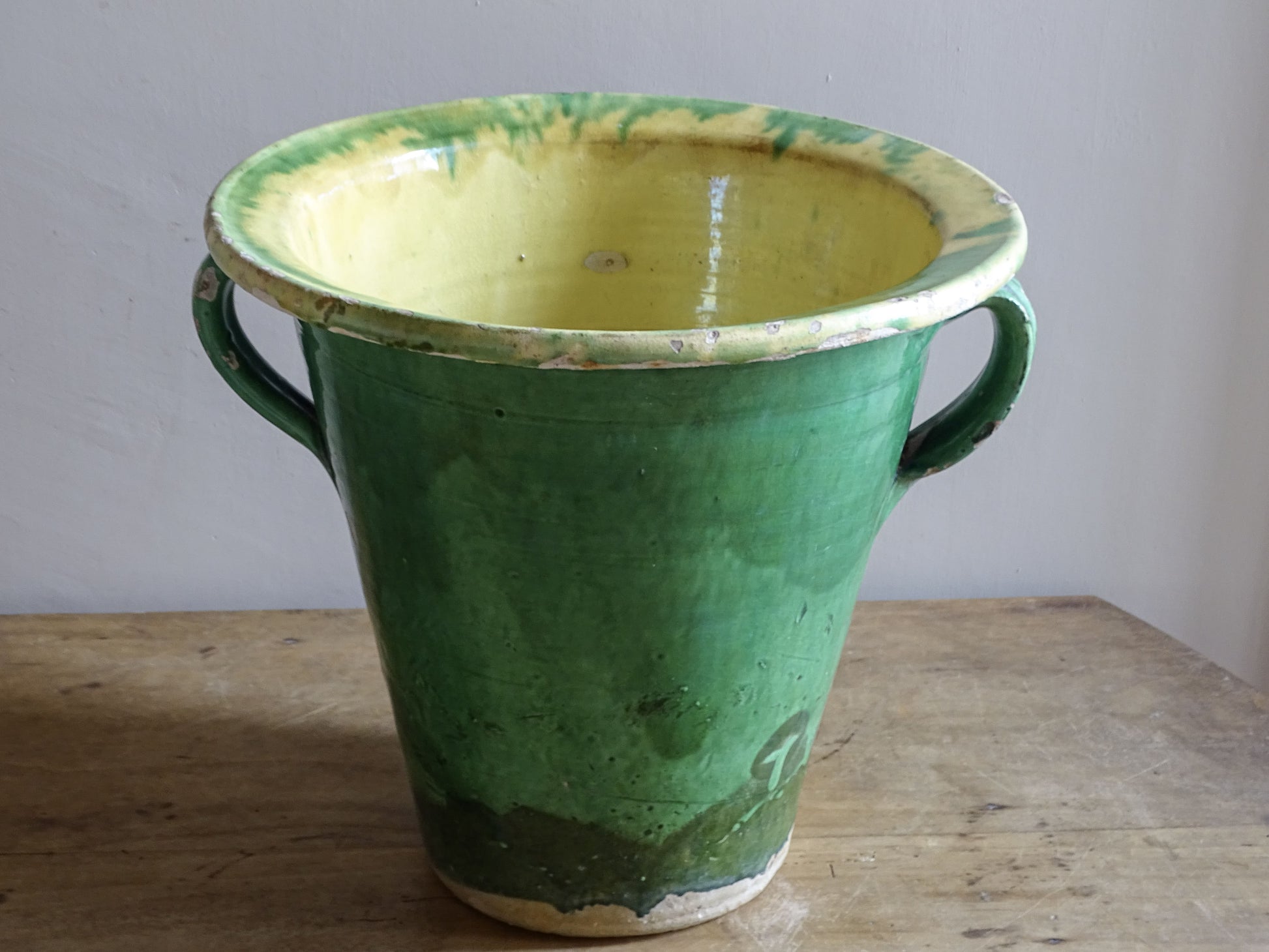 Large antique French green glazed earthenware planter with two handles
