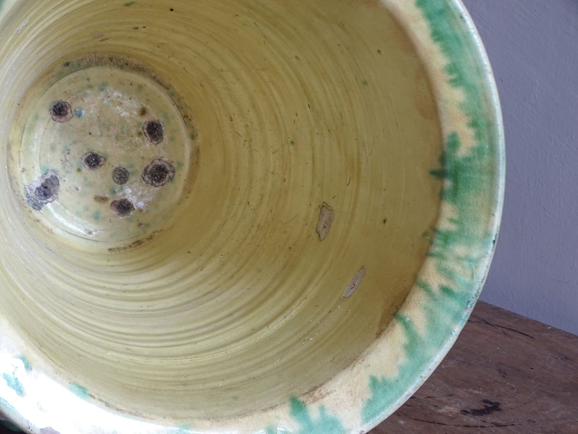 Antique French garden pot with green and yellow glazed finish