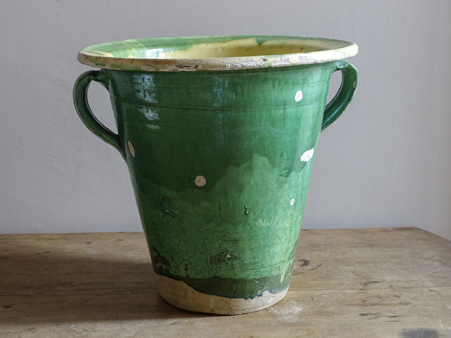 Antique green glazed French planter with twin loop handles