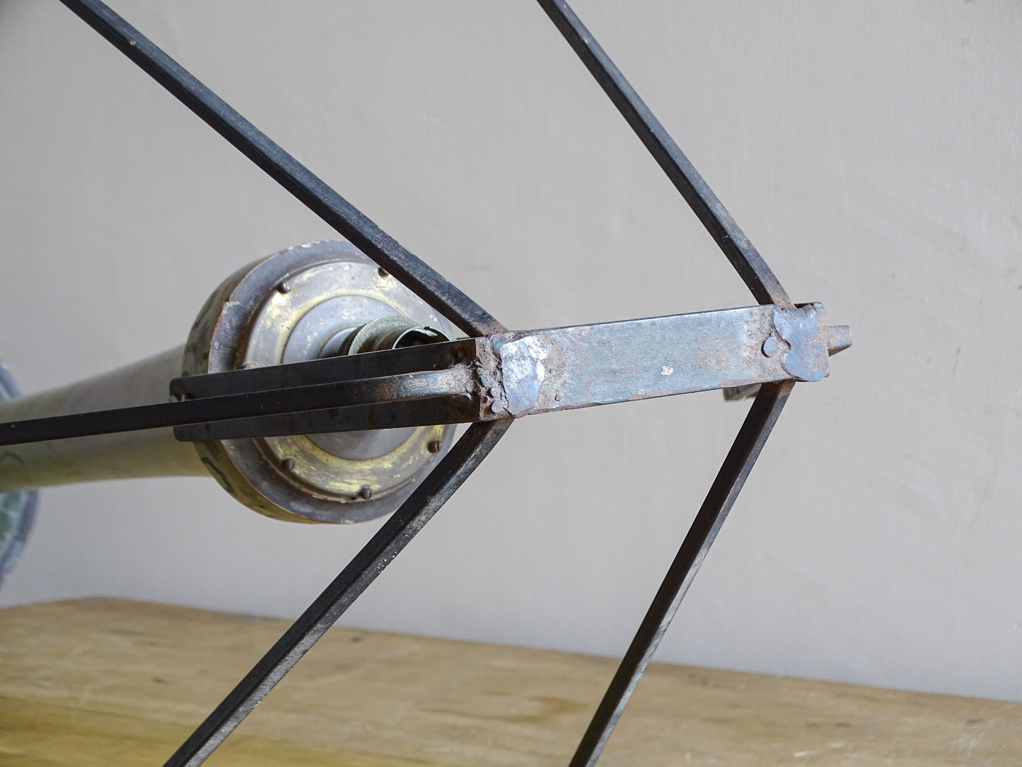 Early 20th century French painted wooden lamp with original iron shade frame
