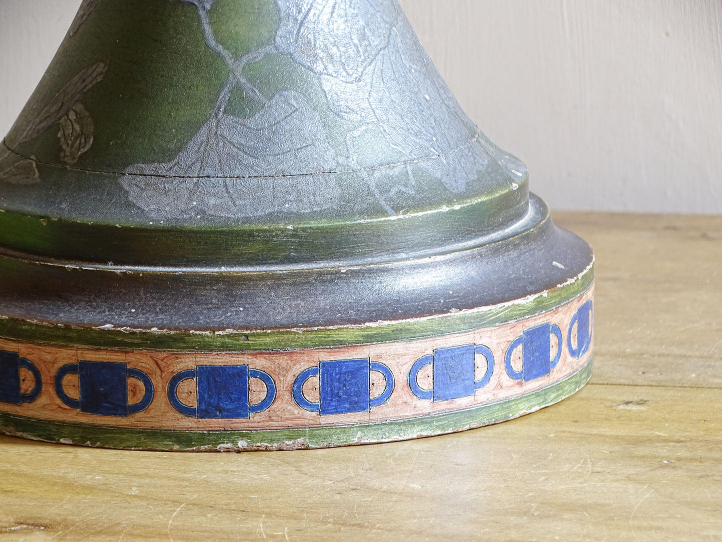 Hand-painted blue geometric border around base of antique French lamp