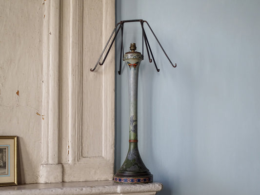 Early 20th century French painted wooden lamp with original iron shade frame on fireplace