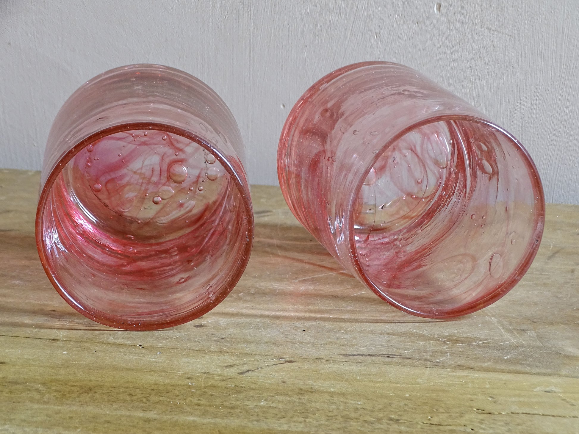 Set of six vintage pink glass tumblers with matching pitcher