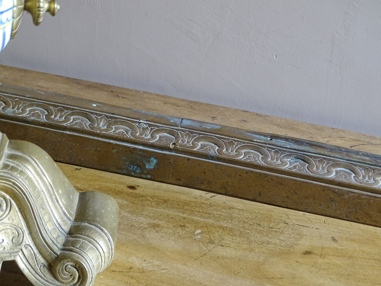 Pair of 19th century French brass fireplace chenets with polychrome ceramic centres