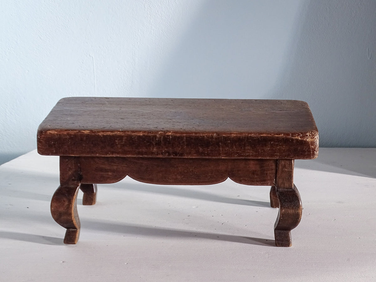Small French antique wooden stool with curved legs 
