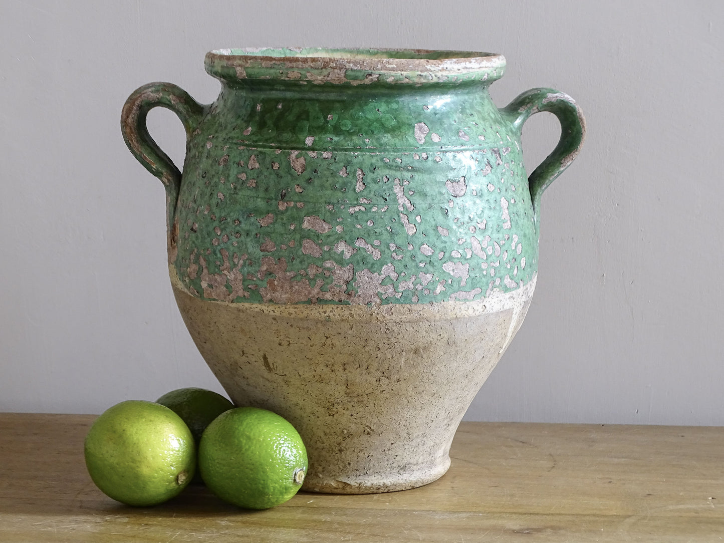 Antique French green glazed confit pot with two handles