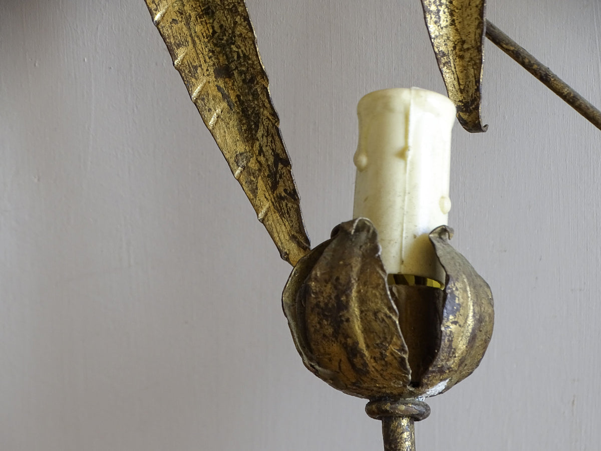 Flower-shaped gilt metal candle cup on a Spanish mid-century wall light