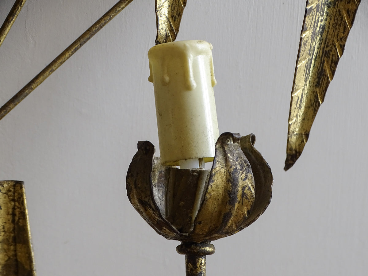 Flower-shaped gilt metal candle cup on a Spanish mid-century wall light