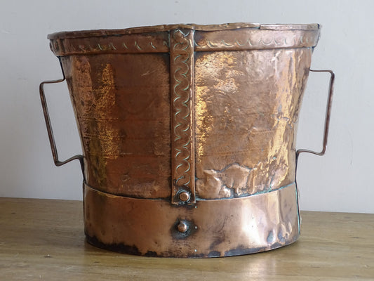 French antique copper vessel dating from the 18th century with riveted construction and punched decoration