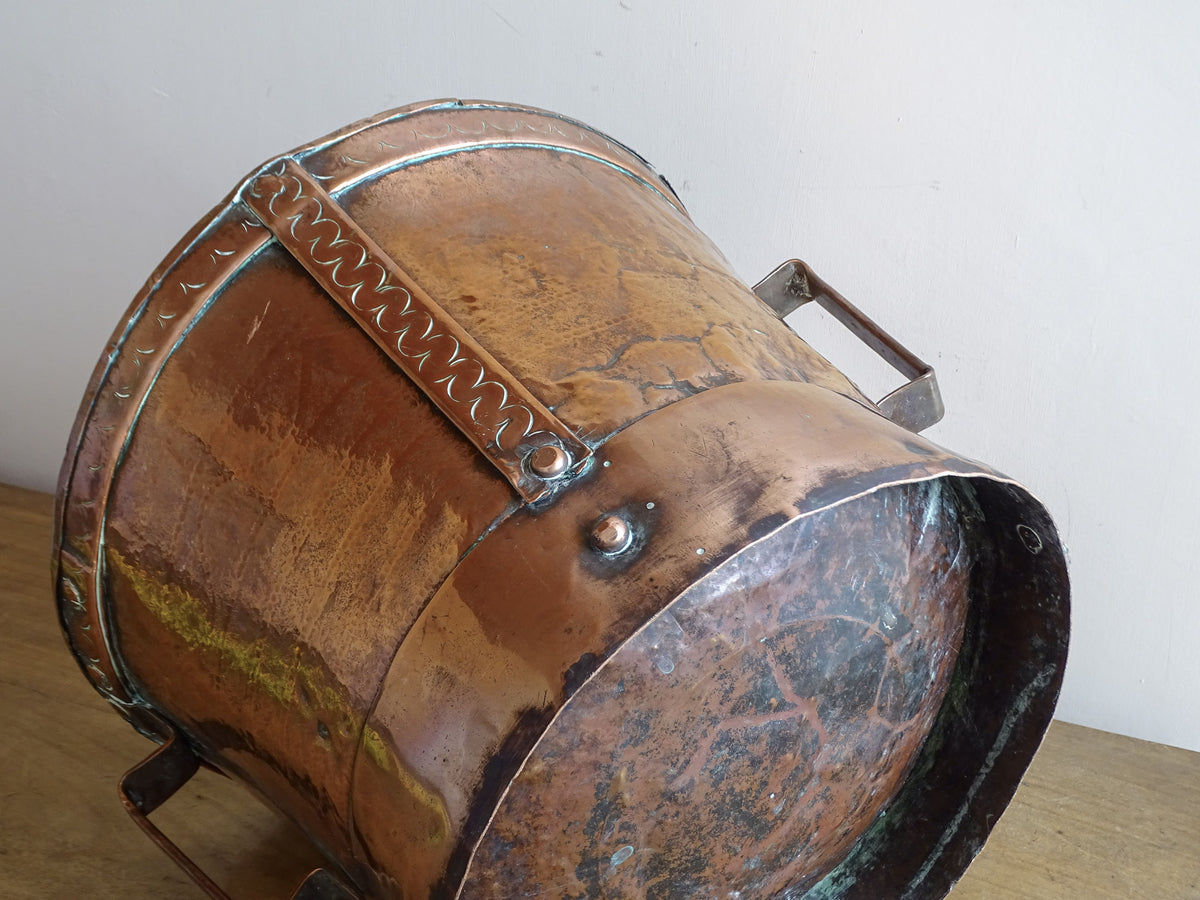Riveted construction and hand-worked copper detail on an antique French ferrat