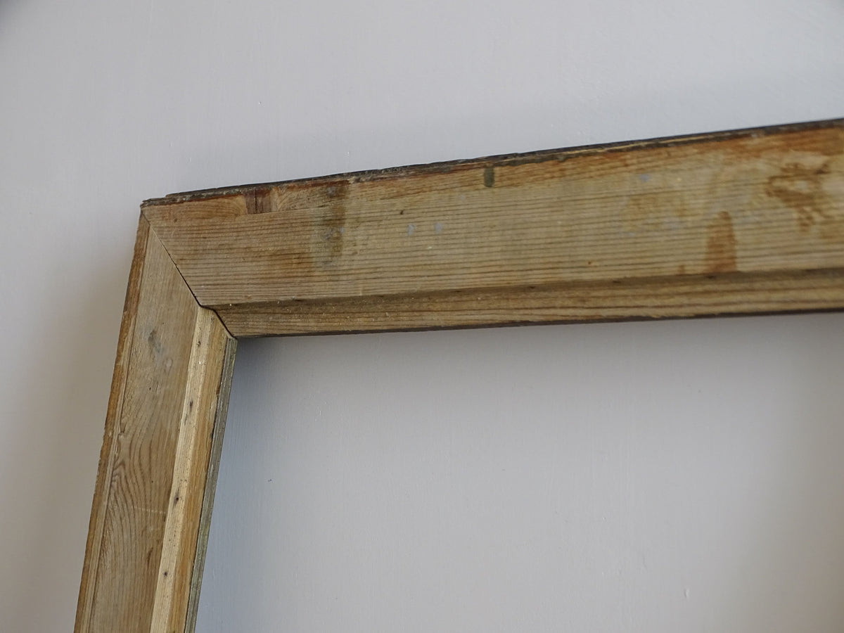 Reverse corner detail of 19th-century French frame showing softwood construction and original aged surface