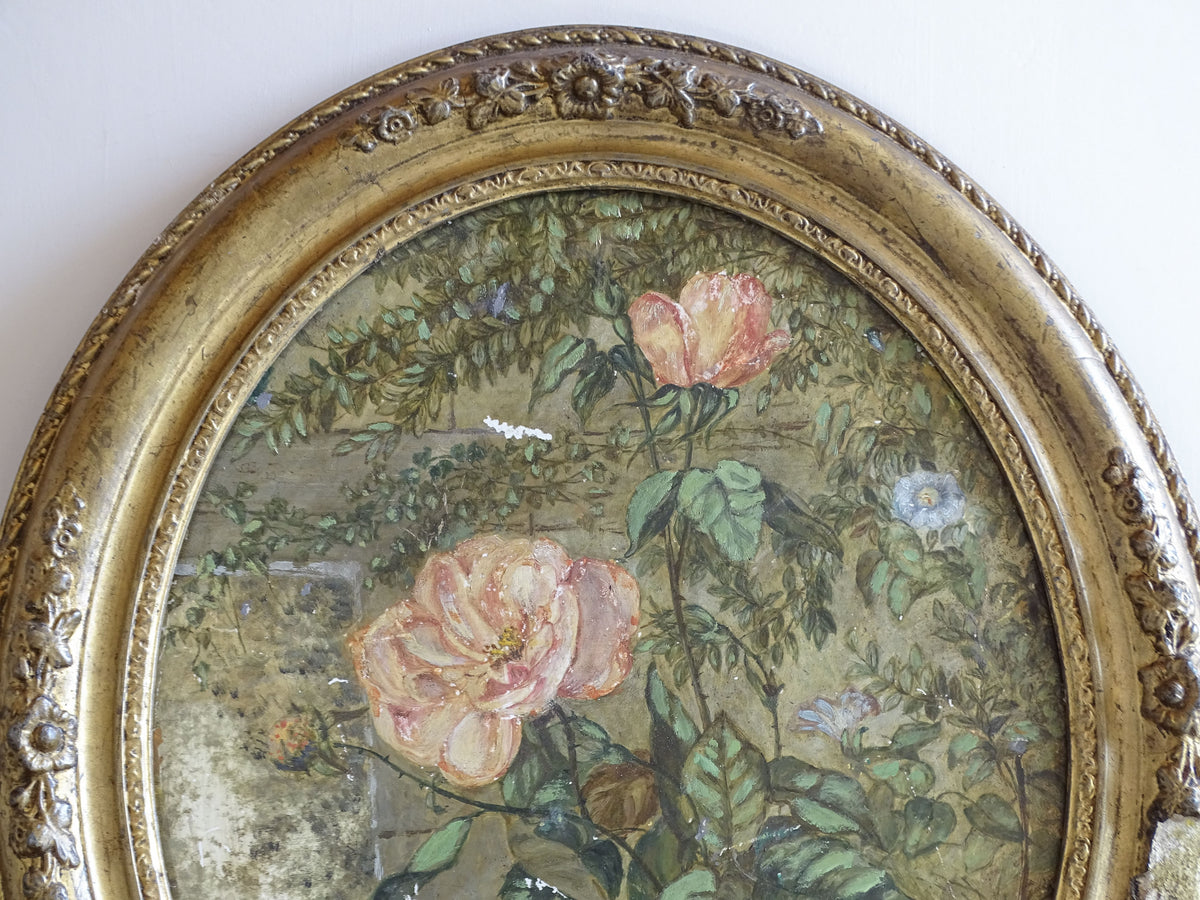 Detail of antique hand-painted ceramic plaque depicting pink roses and garden foliage