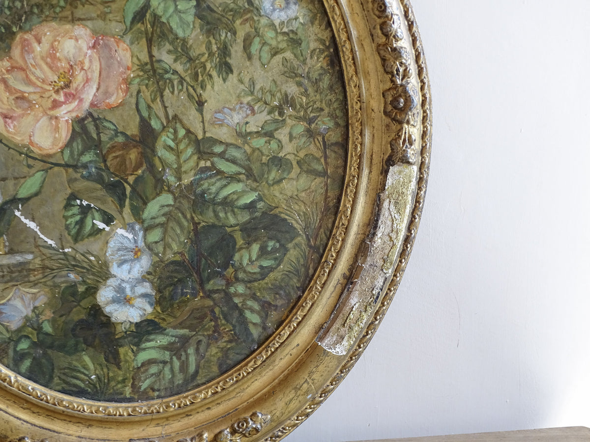 Detail of age-related wear and losses to the gilt decoration on the oval frame