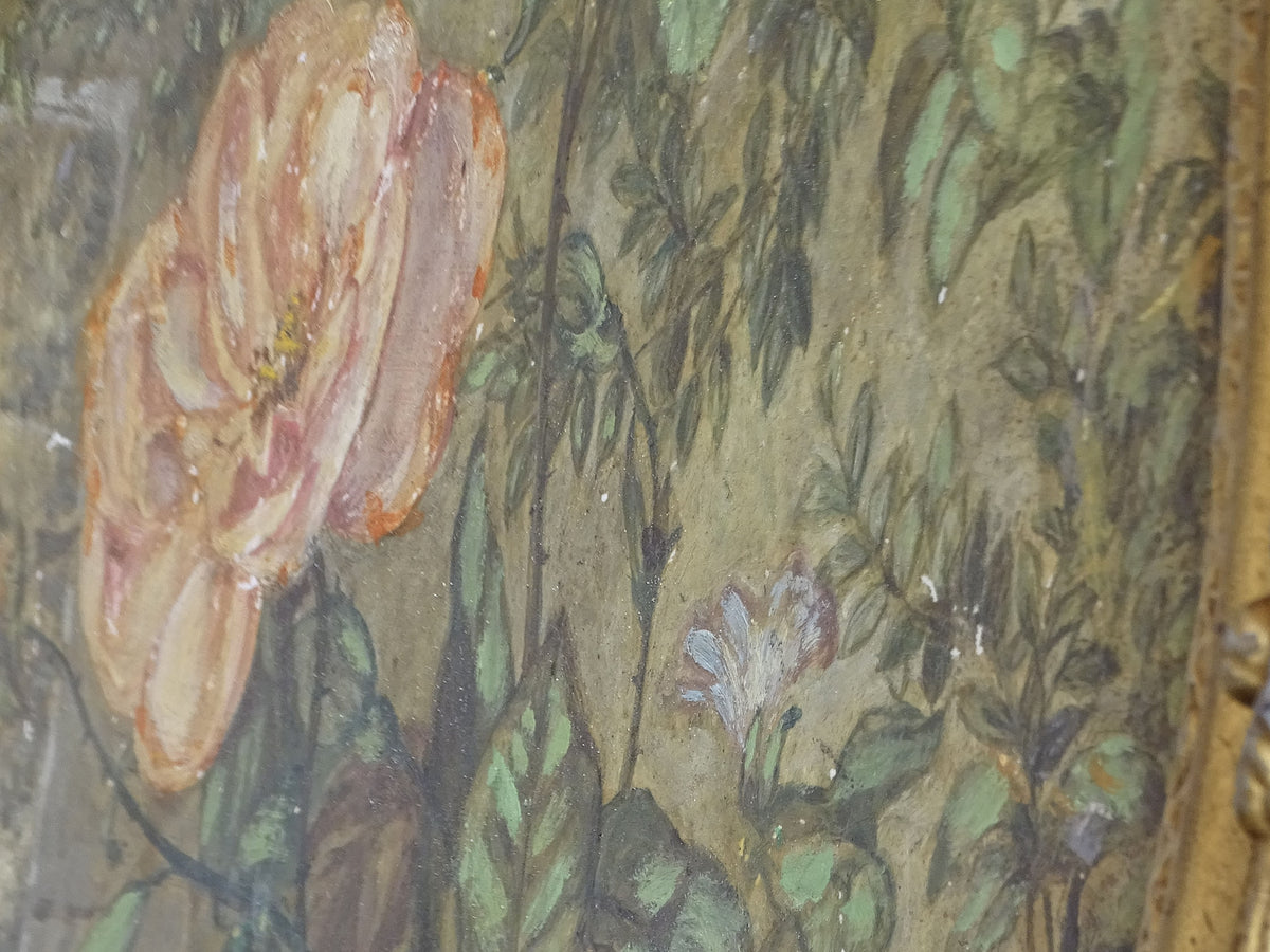 Close-up of hand-painted pink rose and foliage on the antique French ceramic plaque