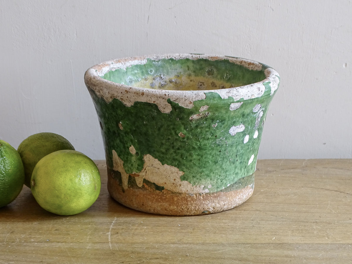 Antique French 19th-century green glazed earthenware pot, front view
