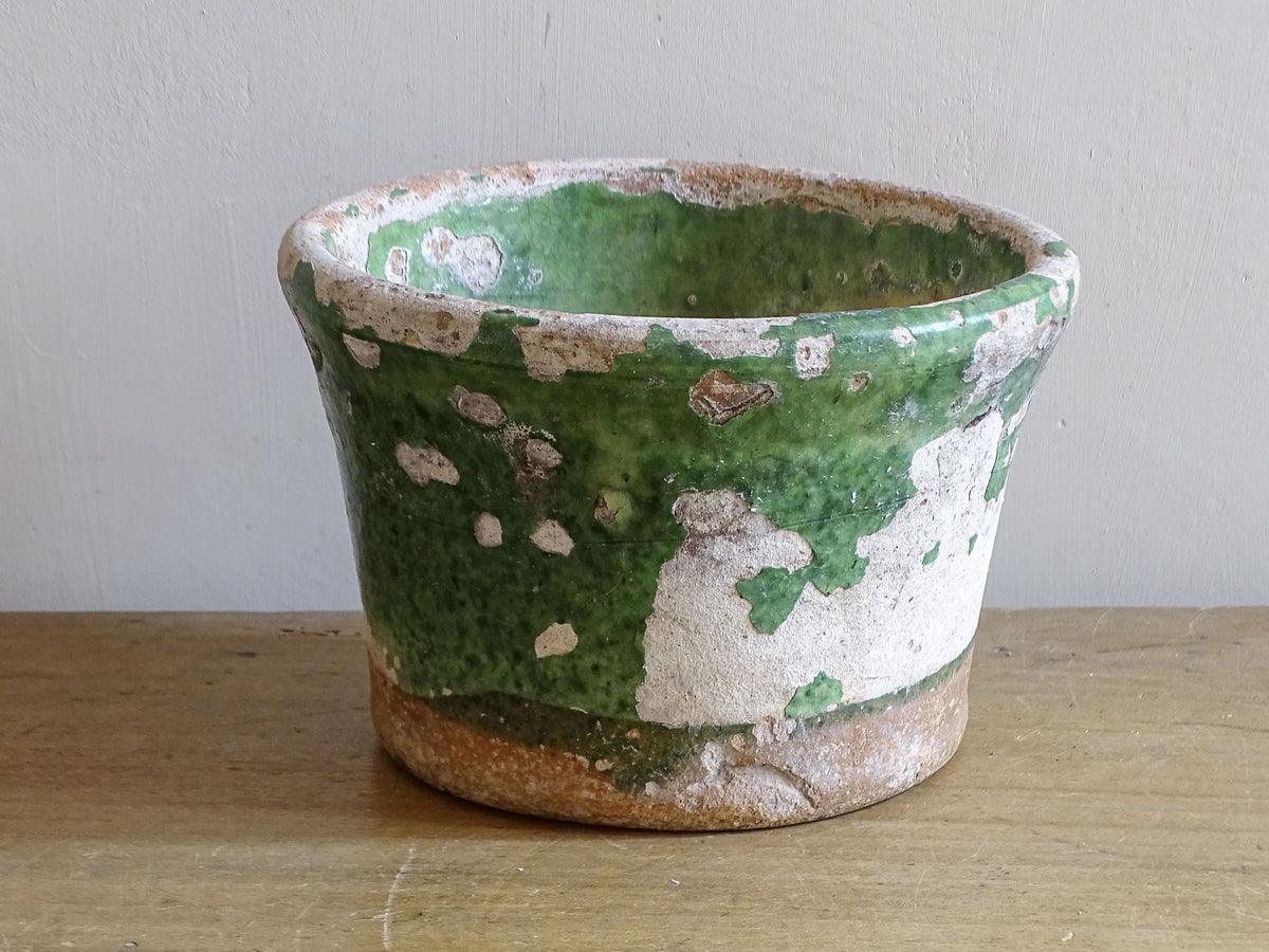 19th-century French green glazed pot with extensive glaze wear