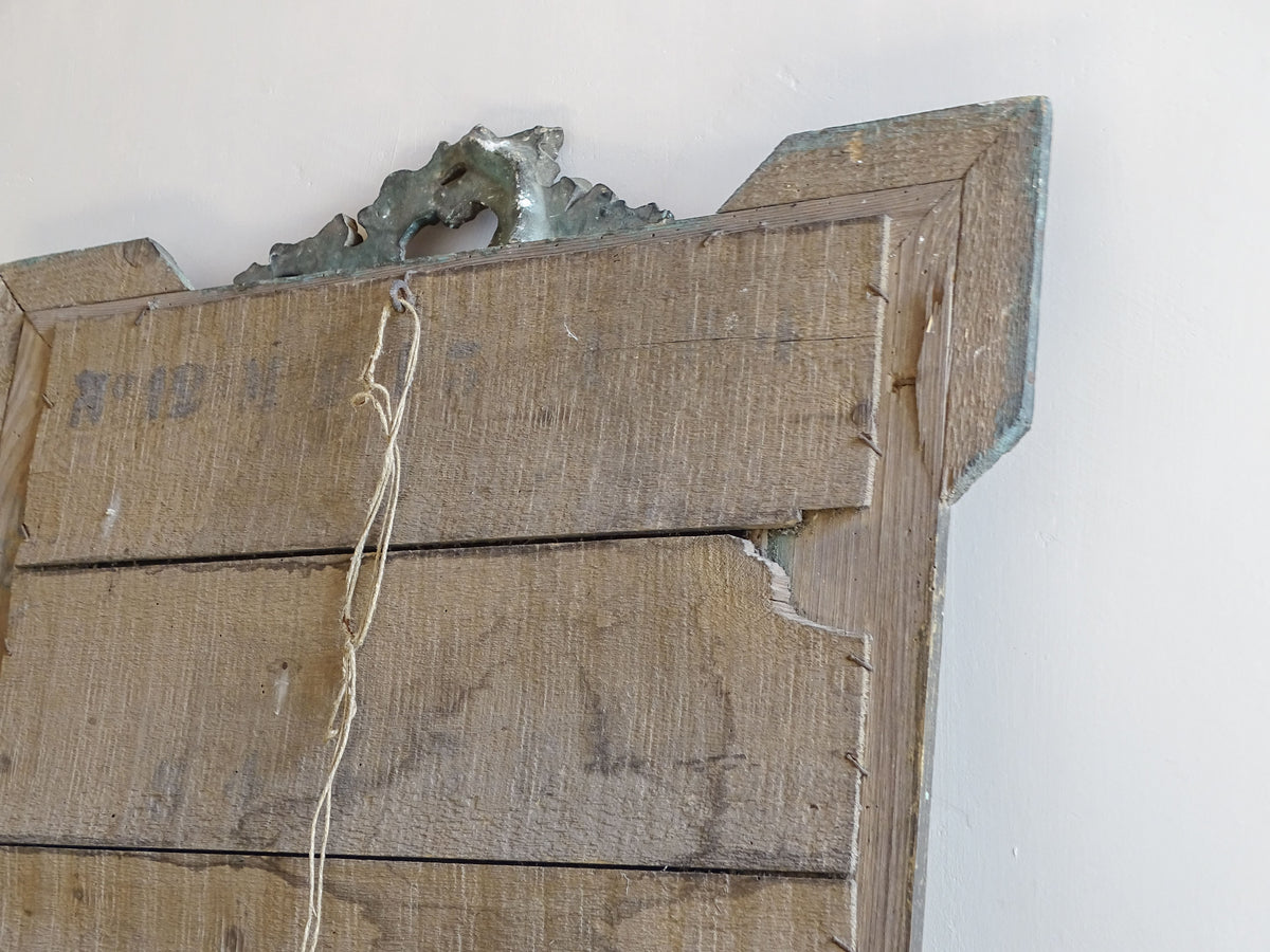Back detail of French antique wood and stucco mirror