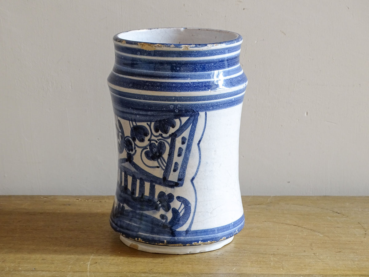 Antique Spanish albarello with hand-painted cobalt blue foliate and architectural details