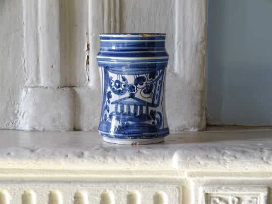 Antique Spanish blue and white albarello with hand-painted architectural decoration