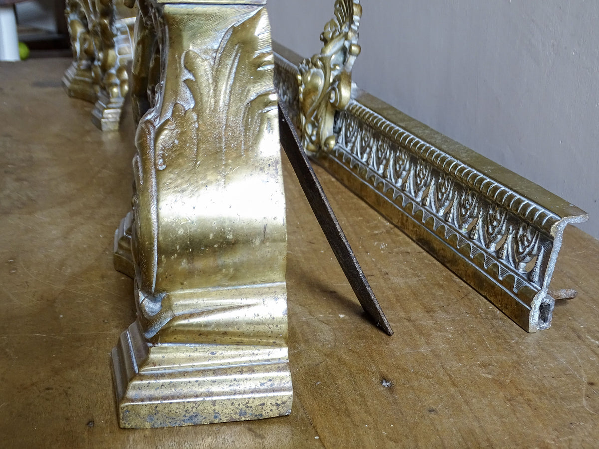 Side and rear detail of a 19th century French brass fireplace fender
