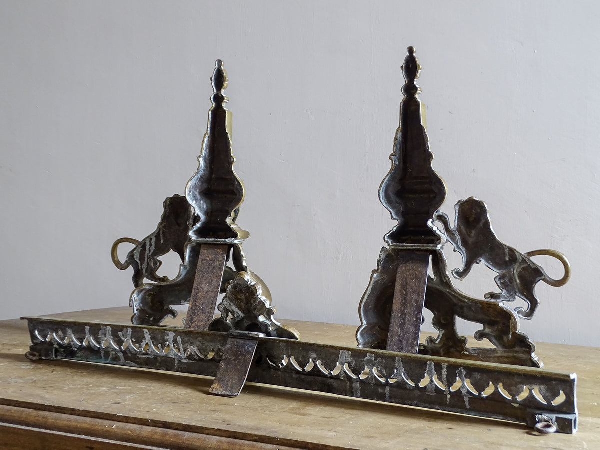 Rear construction and iron supports of an antique French brass fireplace fender