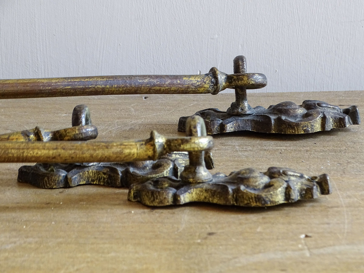 Close-up of original mounting hooks and fixings on antique French curtain holdbacks