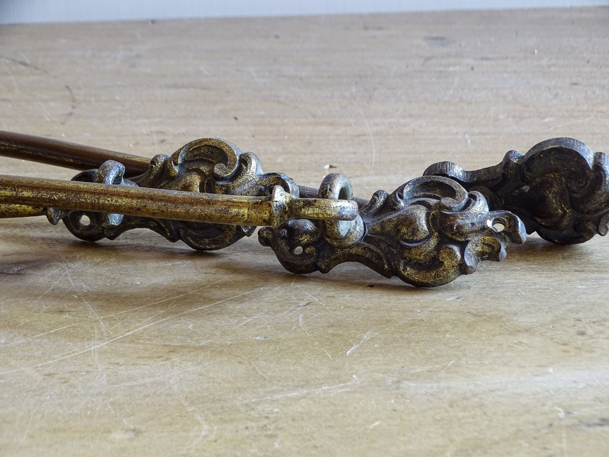 Close-up of original mounting hooks and fixings on antique French curtain holdbacks