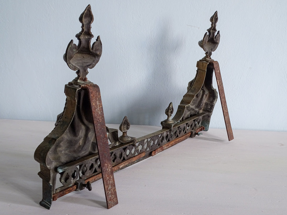 Rear view of antique Napoleon III fireplace fender showing iron supports and adjustable connecting bar