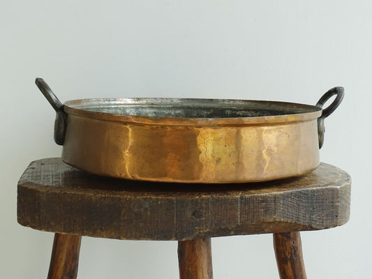 French antique copper pan with two handles and tinned interior. Round copper gratin pan.