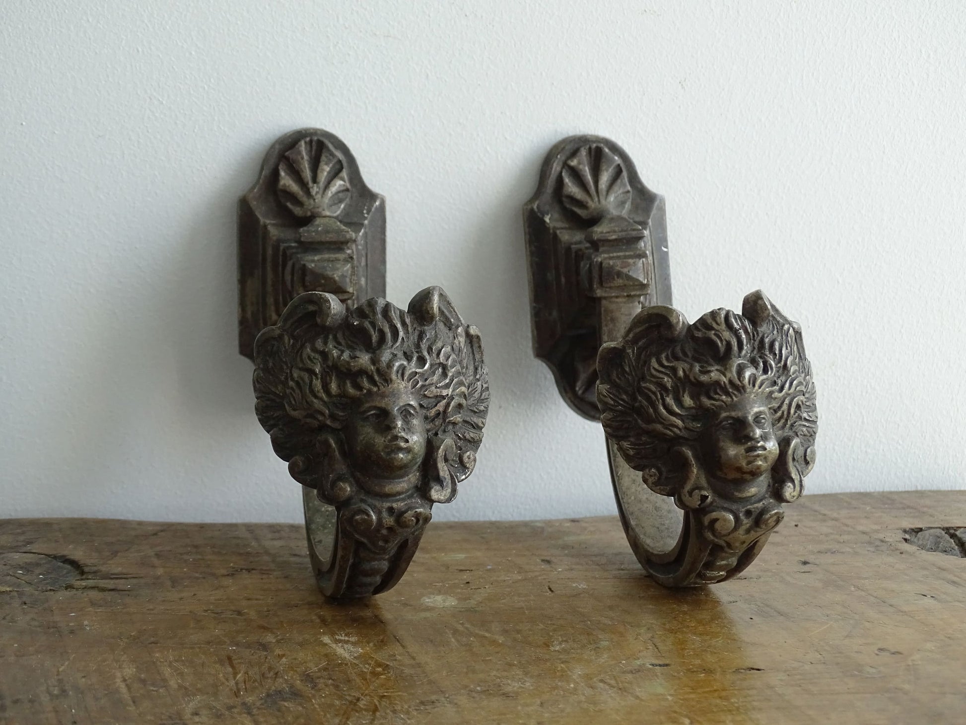 Pair of Antique French Curtain Hooks with Faces 