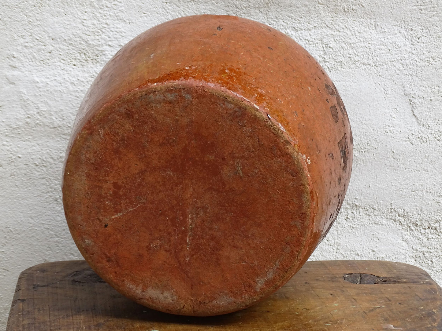 Antique French terracotta pot with brown and yellow glaze. Antique pottery pot for a rustic display.