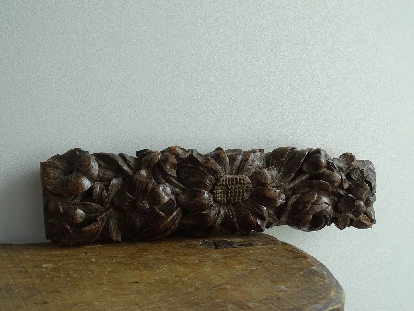 Antique Wooden Carving with Sunflowers