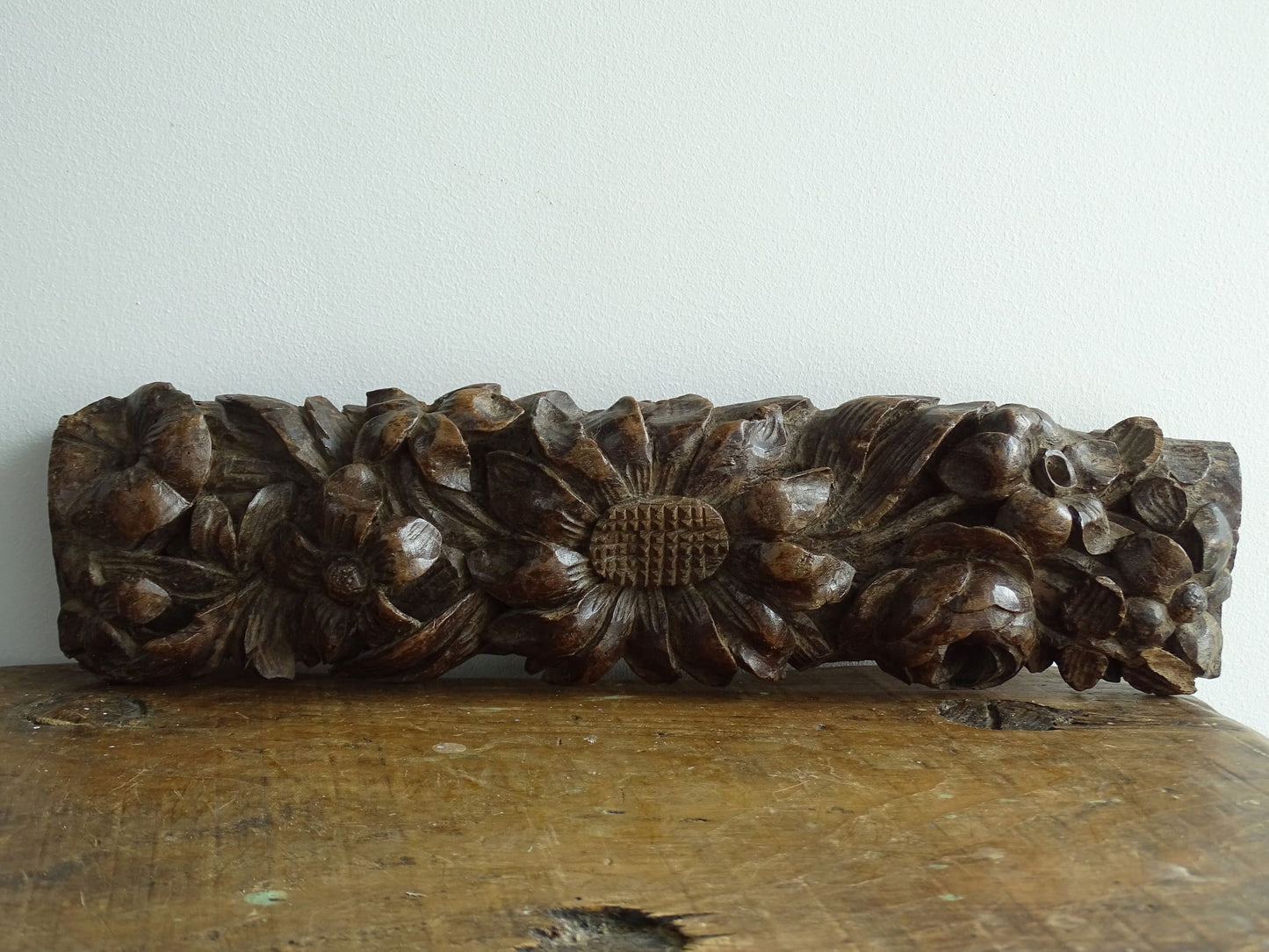 Antique Wooden Carving with Sunflowers