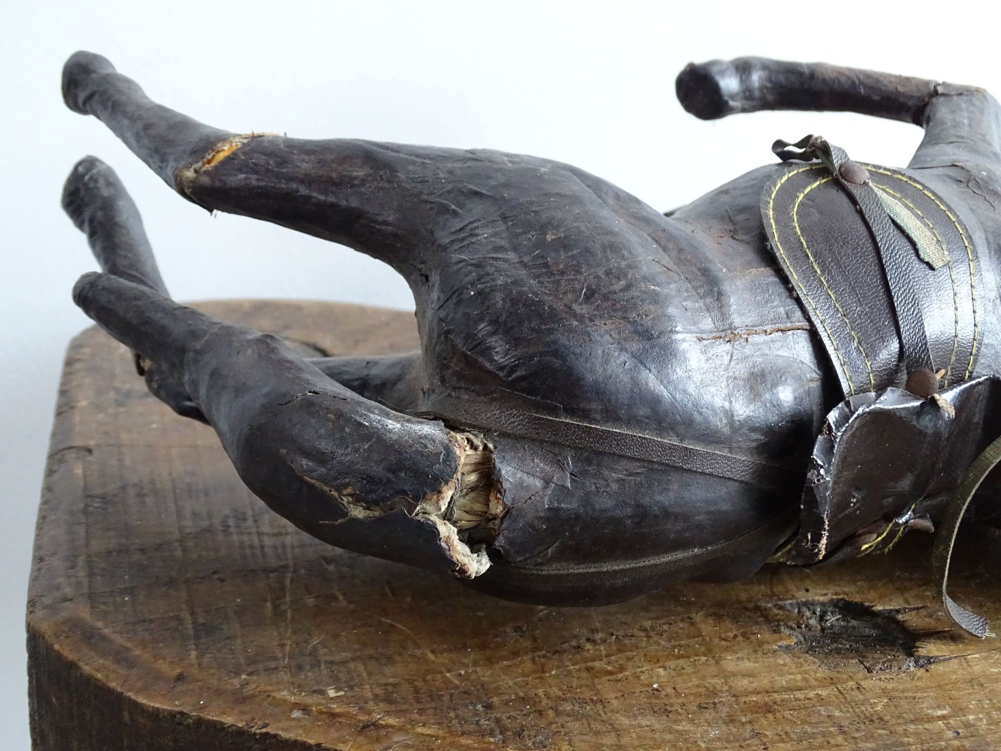 Distressed antique leather horse figurine for vintage shelf decor