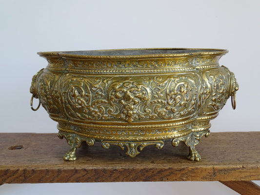 Antique French Brass Quatrefoil Jardiniere with Lion Head Handles and Claw Feet