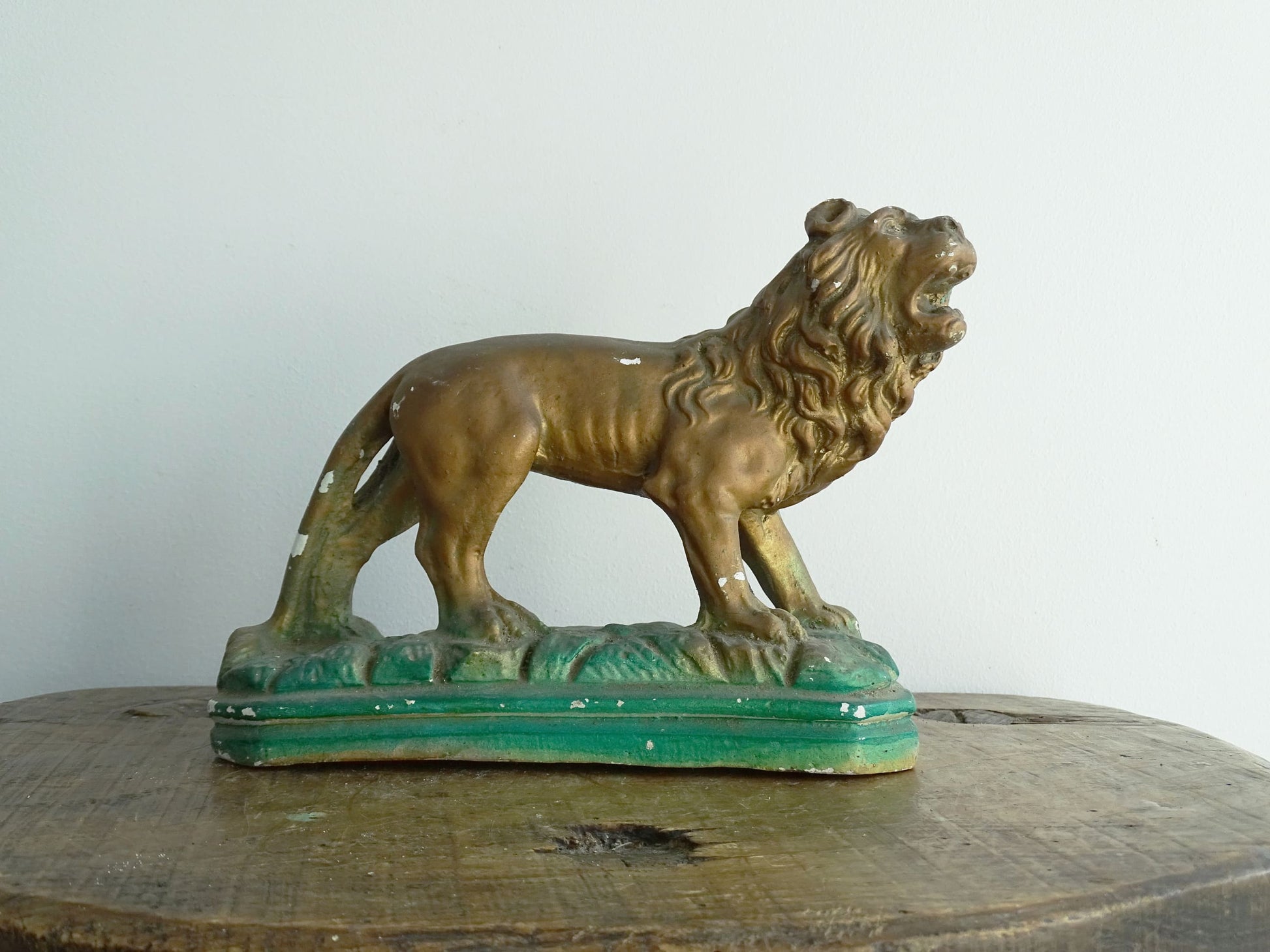 Naïve Painted Plaster Lion Painted Gold with a Green Base