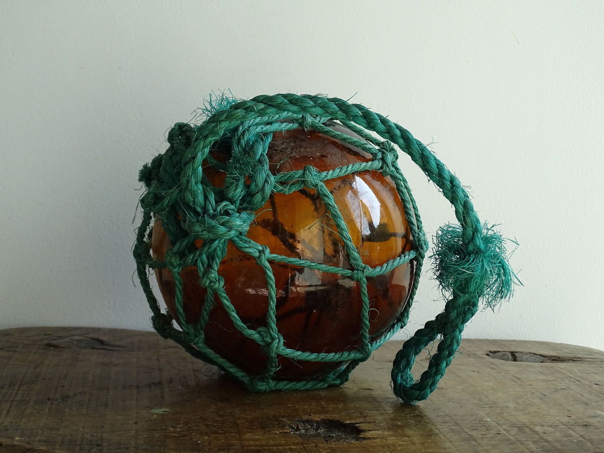 Vintage French Buoy with Amber Glass in Green Rope, Fishing Float